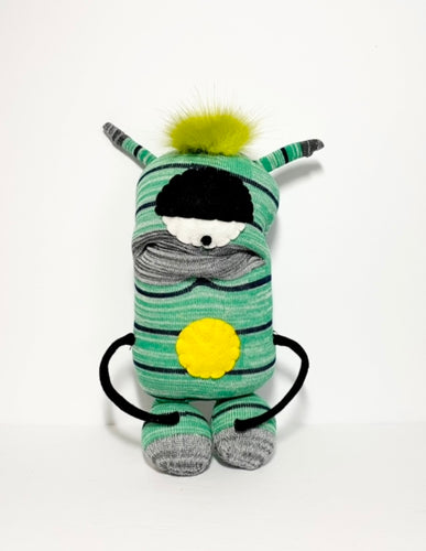 Adopt this friendly yellow sock monster today! Stuf'd Monsters are hand