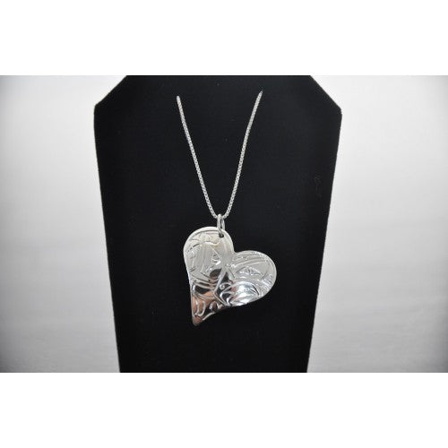 Sterling Silver Heart Necklace With A Hummingbird design. Handmade by Vincent Henson